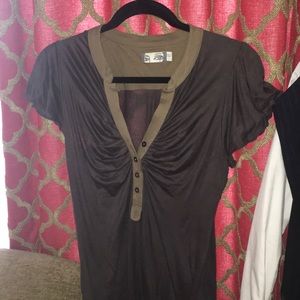 Unique tee shirt with unique styling details.